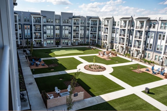 Landscaped sitting with fire pit areas at Fireside at Waukee in Waukee, IA