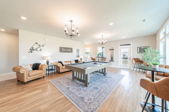 Clubhouse with Community Kitchen, Gathering Space and Billiards Lounge access at Hawthorne Row in Bentonville, AR