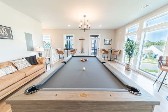 Clubhouse with Community Kitchen, Gathering Space and Billiards Lounge access at Hawthorne Row in Bentonville, AR