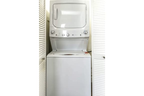 In unit washer and dryer amenity beautiful newly-renovated one, two and three bedroom apartment townhomes with high-end finishes at Highpoint Apartments in Omaha, NE