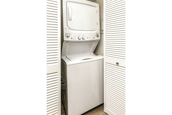 In unit washer and dryer amenity beautiful newly-renovated one, two and three bedroom apartment townhomes with high-end finishes at Highpoint Apartments in Omaha, NE