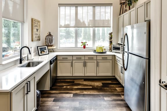 Clubhouse Open Kitchen with Natural Lighting at Legacy Commons Apartments in Omaha, NE