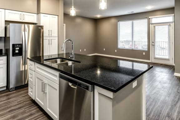 Kitchen Island at The Apartments at Lux 96 in Papillion, NE