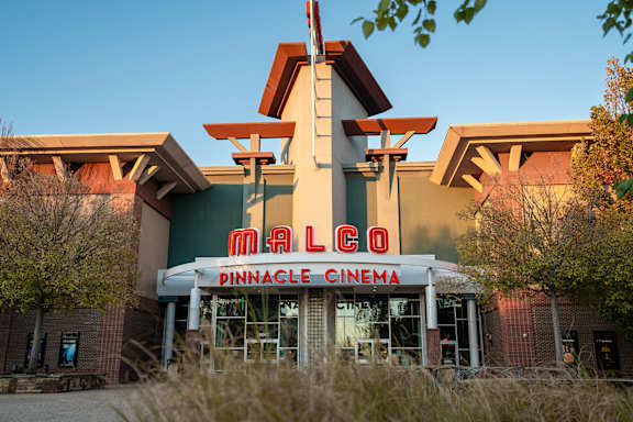 Located by nearby shops and dining at The Grove in Rogers, AR