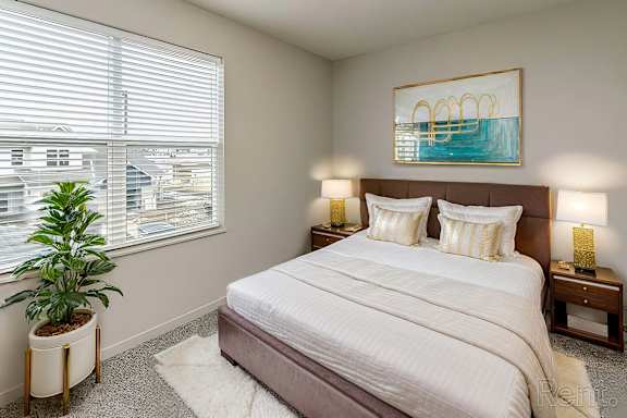 Bedroom With Wide Windows at Sandstone Villas Apartments, Nebraska, 68116