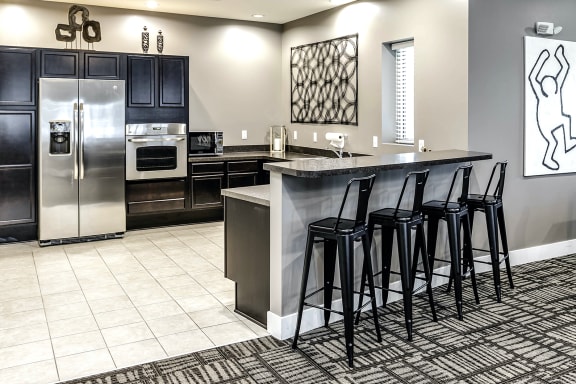 Clubhouse with spacious dining area and kitchen at Tamarin Ridge in Lincoln, NE