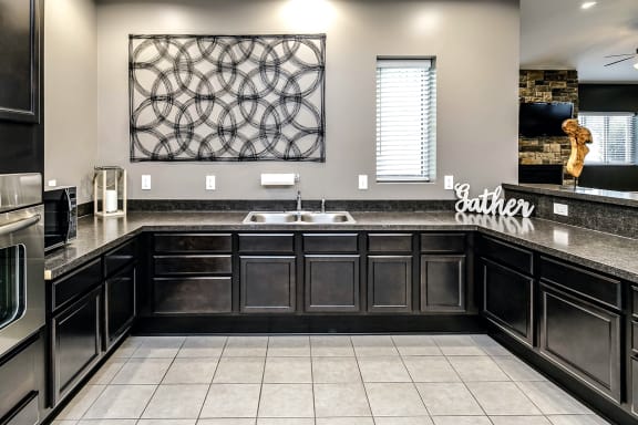 Clubhouse with kitchen and lots of cabinet space at Tamarin Ridge in Lincoln, NE