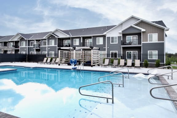 Heated Outdoor Pool with Outdoor Entertaining Area at The 8801 in Lincoln, NE