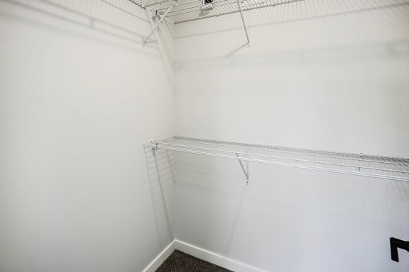 Spacious one and two-bedroom apartments featuring three interior schemes, granite countertops, stainless steel appliances, large kitchens, high-end lighting, vinyl plank flooring and much more at The Brink at Ridgeview in Plattsmouth, NE