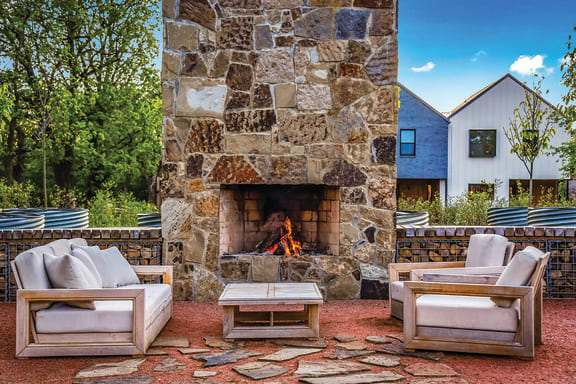 Outdoor Fireplace at Red Barn Apartments and Townhomes in Bentonville, AR
