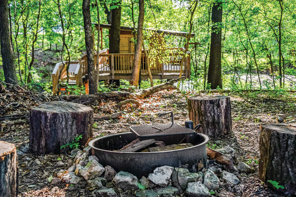 Outdoor Campsites with fire pits at Red Barn Apartments and Townhomes in Bentonville, AR