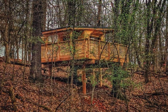 Outdoor treehouse at Red Barn Apartments and Townhomes in Bentonville, AR