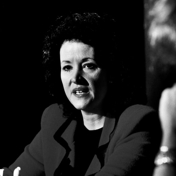 A woman with dark hair and a black blazer is speaking into a microphone. at The Lady, South Carolina