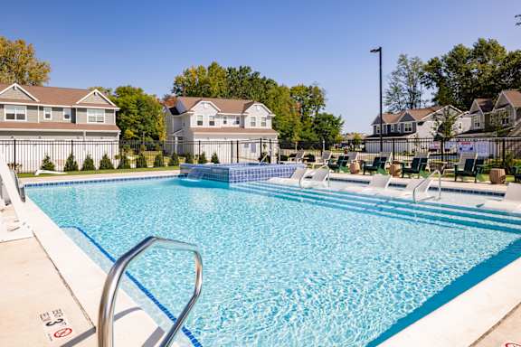 Clubhouse swimming pool at Okemos Apartments | Okemos Grand Reserve