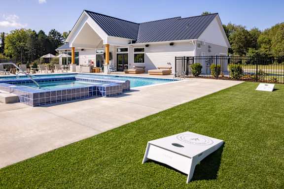 Clubhouse swimming pool at Okemos Apartments | Okemos Grand Reserve