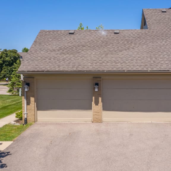 Attached garages available | River Oaks West Apartments in Novi, MI