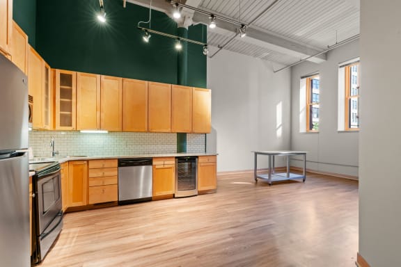 Kitchen and living area. Lowertown Lofts  in St. Paul, MN 3 Bedroom 2.5 Bath Plus Den Apartment  at Lowertown Lofts, Minnesota