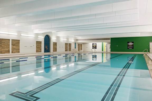 a swimming pool in a building with a glass floor  at Lowertown Lofts, Minnesota