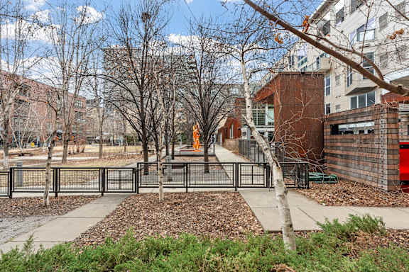 A park with a statue in the middle of it.