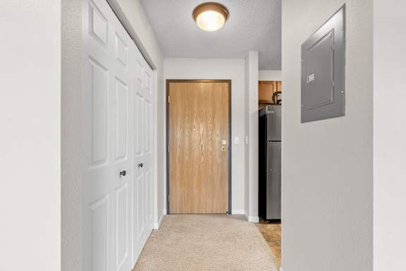 Hallway of the Mahogany floor plan at Cedars Lakeside, Little Canada 55117