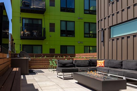 Rooftop Green Space with Grills and Fire Pits at The Whit, Minneapolis