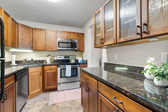 Kitchen in the Mahogany floor plan at Cedars Lakeside, Little Canada 55117