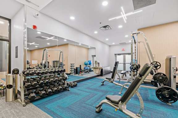 Fitness Center including free weights, weightlifting equipment and machines, and cardio equipment at The Cosmopolitan, St Paul, MN, Minnesota