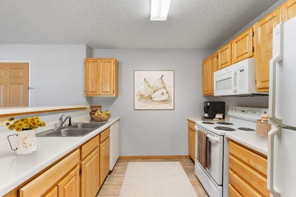 Kennsington Three Bedroom Two Bathroom Floor Plan at The Preserve at Commerce in Rogers, MN 55374
