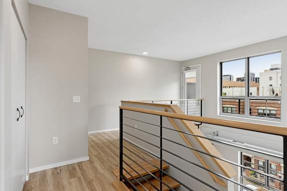 A room with a staircase leading to the second floor.