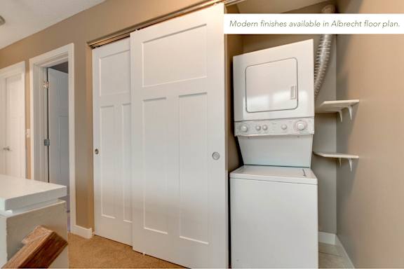 A laundry room with a washer and dryer.