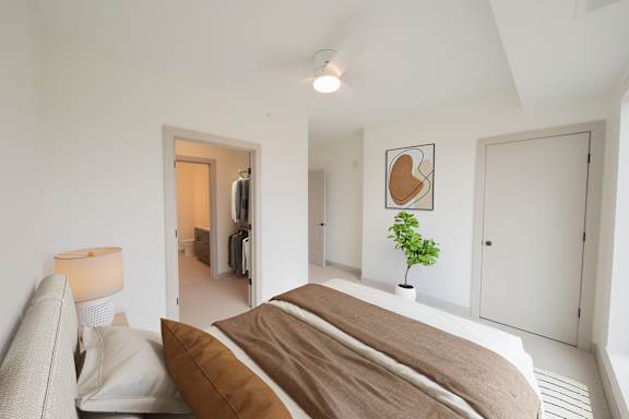 Primary bedroom in the C4 two bedroom two bathroom floor plan at The Mera in St. Louis Park, Minnesota