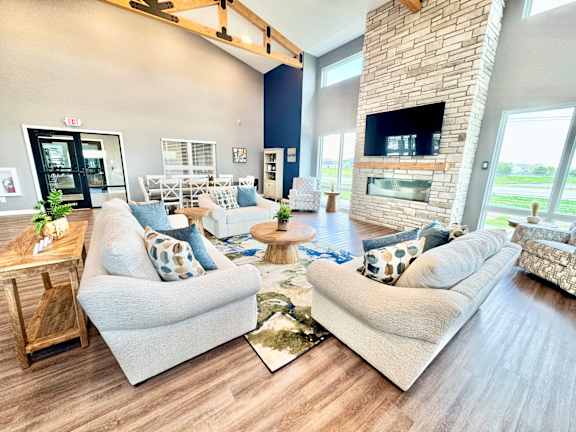 A living room with a fireplace and a couch.