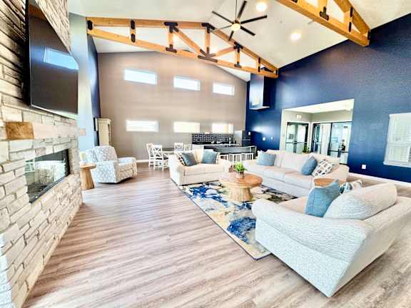 A living room with a fireplace and a couch.