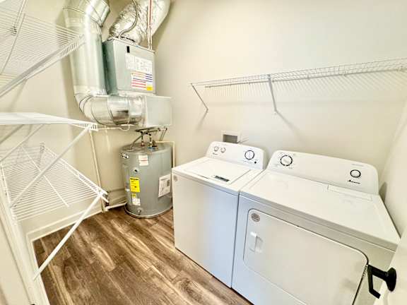 A laundry room with a washer and dryer.
