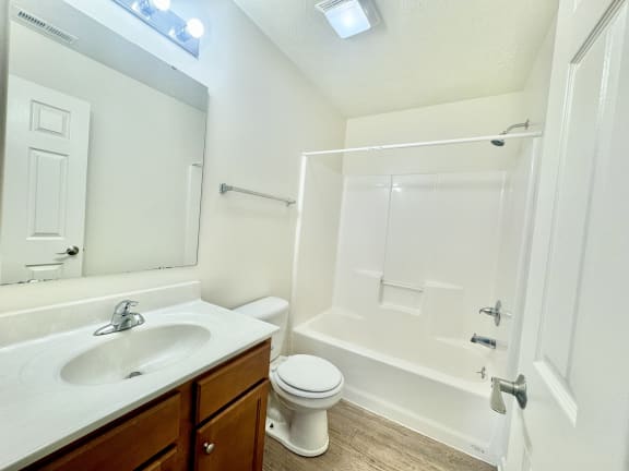 bathroom with tub and shower and sink at Hawthorne Properties in Lafayette, IN 47905