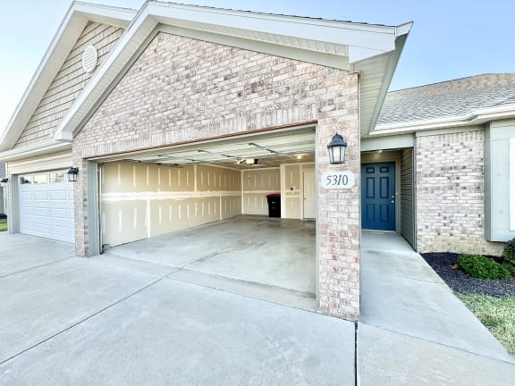 a large garage door in front of a house at Hawthorne Properties in Lafayette, IN 47905