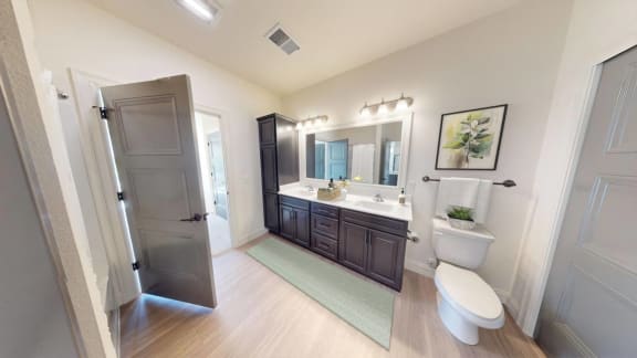 a bathroom with a toilet and a sink