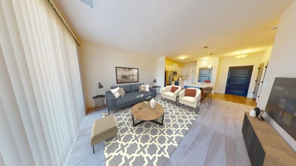 a living room with a couch and a table