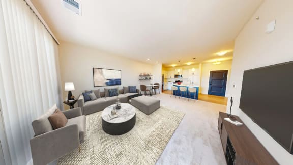 a living room with a couch and a tv