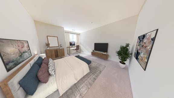 a bedroom with a bed and a television in a house