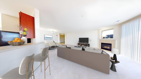 a living room with a long counter and a fireplace