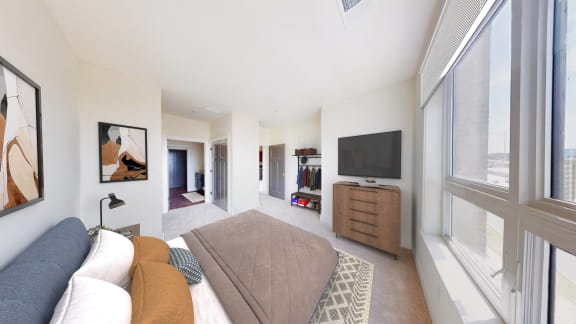 a living room with a couch and a tv