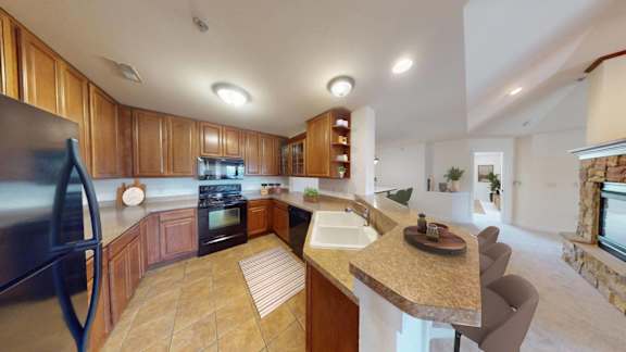 a kitchen with a sink and a counter top