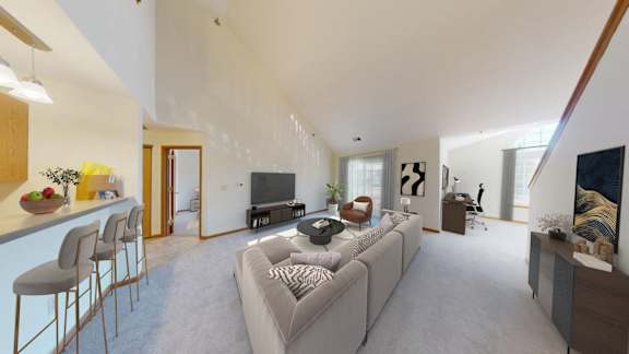 a living room with a couch and a table