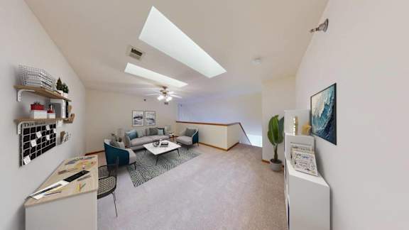 a living room with a couch and a table