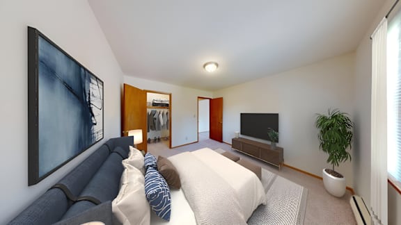 a living room with a couch and a tv