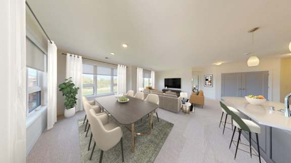A modern dining room with a large table and chairs.