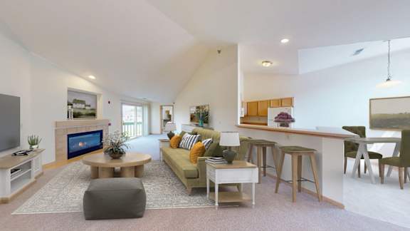 A living room with a couch, a coffee table, and a television.