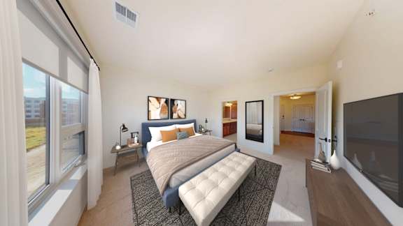 A bedroom with a large bed and a window overlooking a cityscape.