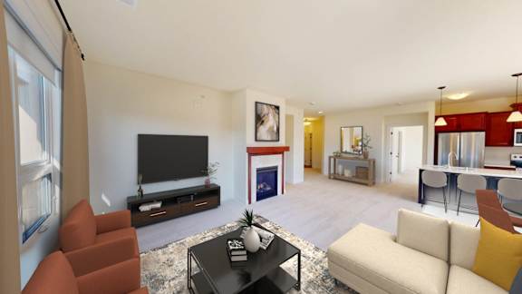 A living room with a fireplace and a television.